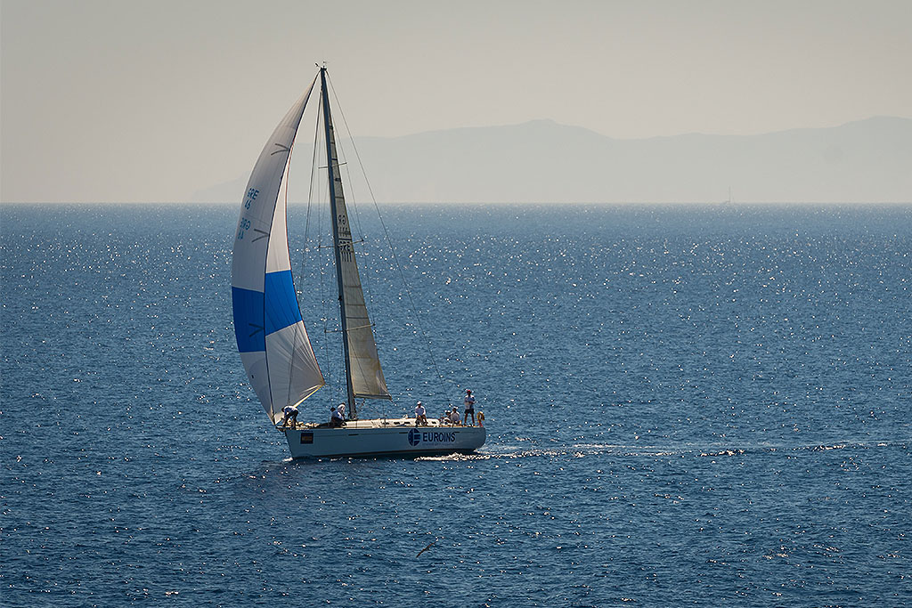 white-and-blue-sailboat-on-thasos